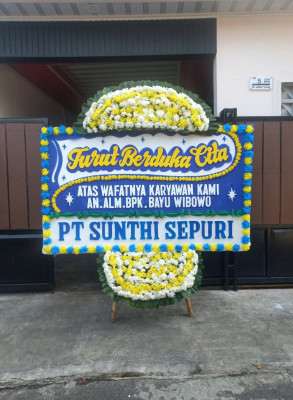 Papan Bunga Duka di Flamboyan Baru