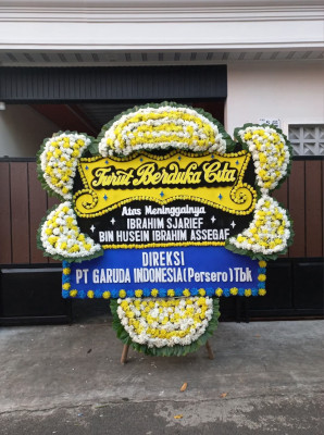 Papan Bunga Duka di Flamboyan Baru