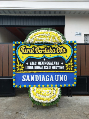 Papan Bunga Duka di Flamboyan Baru
